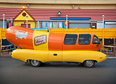 AUT 36 RK0052 01
Oscar Mayer Wienermobile Profile View On Pavement By Restaurant