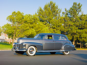 AUT 37 RK0031 01
1949 Cadillac 75 Imperial Limousine Gray 3/4 Front View On Pavement By Trees