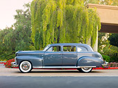AUT 37 RK0033 01
1949 Cadillac 75 Imperial Limousine Gray Profile View On Pavement By Trees And Building