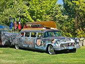 AUT 37 RK0029 01
1955 Chevrolet Airport Limousine Custom Blue Unrestored With Luggage 3/4 Front View On Grass By Trees