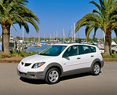 AUT 38 RK0013 01
2003 Pontiac Vibe White 3/4 Side View On Pavement By Harbor