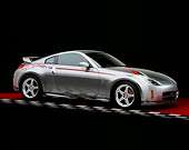 AUT 38 RK0210 02
2003 Nissan Nismo Z S-Tune Silver With Graphics 3/4 Side View On Checkered Line Red Floor Studio