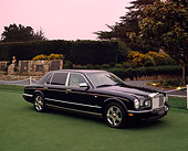 AUT 38 RK0029 02
2003 Bentley Arnage R Black Side 3/4 View On Grass By Trees And Bushes