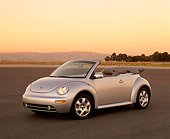 AUT 38 RK0093 03
2003 VW New Beetle Convertible Silver 3/4 Front View On Pavement Filtered
