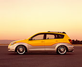 AUT 38 RK0119 01
2003 Pontiac Vibe Yellow And Silver Super Charged Suspension Techniques Profile On Pavement Filtered