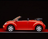AUT 38 RK0139 08
2003 VW New Beetle Convertible Sundown Orange Profile View Studio