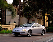 AUT 38 RK0156 01
2003 Honda Accord EX Silver Low 3/4 Front View On Pavement By House