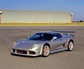 AUT 38 RK0225 01
2003 GSR Noble M12 GTO Silver 3/4 Front View On Pavement By Airplane Hanger