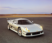 AUT 38 RK0232 01
2003 GSR Noble M12 GTO Silver 3/4 Front View On Pavement Filtered