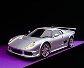AUT 38 RK0242 03
2003 GSR Noble M12 GTO Silver 3/4 Front View On Purple Floor Studio
