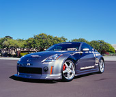 AUT 38 RK1872 03
2003 Nissan 350Z Custom Silver Low 3/4 Front View On Pavement Trees Blue Sky