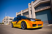 AUT 38 RK1882 01
2003 Volkswagen GTI 20th Anniversary Yellow With Flames Low 3/4 Front View On Pavement
