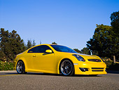 AUT 38 RK1889 01
2003 Infiniti G35 Yellow   Low 3/4 Side View On Pavement By Trees