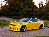 AUT 38 RK1892 02
2003 Infiniti G35 Yellow   Side 3/4 View On Pavement By Trees And Bushes