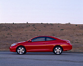 AUT 39 RK0052 01
2004 Toyota Camry Solara Red Profile View On Pavement By Hill
