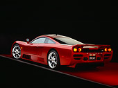AUT 39 RK0078 05
2004 Saleen S7 Red 3/4 Rear View On Red Floor Gray Line Studio