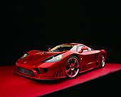 AUT 39 RK0080 06
2004 Saleen S7 Red Wide Angle Shot 3/4 Front View On Red Floor Studio