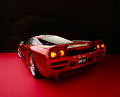 AUT 39 RK0083 02
2004 Saleen S7 Red 3/4 Rear View Wide Angle On Red Floor Studio