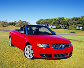 AUT 39 RK0258 06
2004 Audi S4 Cabriolet quattro Red 3/4 Front View On Grass By Trees