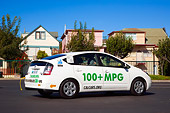 AUT 39 RK0364 01
2004 Toyota Prius Plug-In Hybrid White 3/4 Rear View On Pavement By Houses Trees Blue Sky