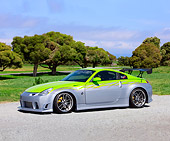 AUT 39 RK0368 01
2004 Nissan 350Z Green And Silver 3/4 Front View By Trees Blue Sky