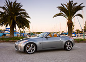 AUT 39 RK0380 01
2004 Nissan 350Z Silver 3/4 Front View By Marina Palm Trees Blue Sky