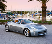AUT 39 RK0382 01
2004 Nissan 350Z Silver 3/4 Front View By Marina Palm Trees Blue Sky