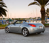 AUT 39 RK0383 01
2004 Nissan 350Z Silver 3/4 Rear View By Marina Palm Trees Blue Sky