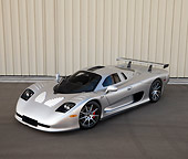 AUT 39 RK0397 01
2004 Mosler MT900S Silver 3/4 Front View On Pavement