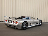 AUT 39 RK0398 01
2004 Mosler MT900S Silver 3/4 Rear View On Pavement