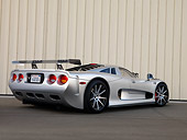 AUT 39 RK0399 01
2004 Mosler MT900S Silver 3/4 Rear View On Pavement