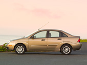 AUT 40 RK0230 01
2005 Ford Focus Gold Profile View On Pavement By Water