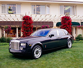 AUT 40 RK0055 08
2005 Rolls-Royce Centenary Edition Phantom Blue 3/4 Front View On Grass By Building