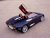 AUT 40 RK0070 01
2005 Spyker C8 Spyder Black Overhead 3/4 Rear View Door Open On Pavement