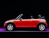 AUT 40 RK0081 04
2005 Mini Cooper Convertible Orange Side View On Purple Floor Gray Line Studio