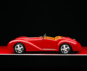 AUT 40 RK0085 01
2005 Apollo Monza Spyder Red Profile View On Red Floor Gray Line Studio