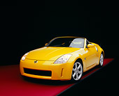 AUT 40 RK0108 07
2005 Nissan 350Z Roadster Yellow 3/4 Front View On Red Floor Studio