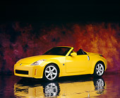 AUT 40 RK0115 01
2005 Nissan 350Z Roadster Yellow 3/4 Side View On Mylar Floor Mottled Background Studio