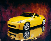 AUT 40 RK0116 06
2005 Nissan 350Z Roadster Yellow 3/4 Front View On Mylar Floor Mottled Background Studio