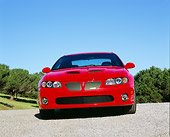 AUT 40 RK0121 01
2005 Pontiac GTO Coupe Red Low Head On Shot On Pavement Trees Blue Sky