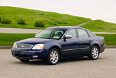 AUT 40 RK0123 01
2005 Ford Five Hundred Sedan Blue 3/4 Front View On Pavement By Grass Hills