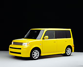 AUT 40 RK0141 06
2005 Scion XB Yellow 3/4 Side View On White Seamless Floor Studio