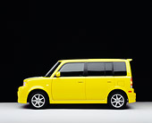 AUT 40 RK0142 07
2005 Scion XB Yellow Profile View On White Floor Studio