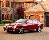 AUT 40 RK0144 02
2005 Cadillac STS Red 3/4 Side View On Driveway By House