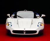 AUT 40 RK0193 04
2005 Maserati MC12 Pearl White And Blue Head On Shot On Red Floor Studio