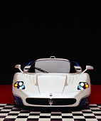 AUT 40 RK0194 11
2005 Maserati MC12 Pearl White And Blue Head On Shot On Checkered Floor Studio