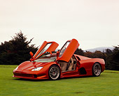 AUT 40 RK0212 01
2005 SSC Aero Copper 3/4 Side View Doors Up On Grass
