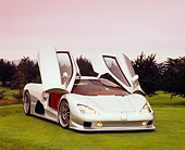 AUT 40 RK0222 02
2005 SSC Aero Silver 3/4 Front View On Grass Doors Up By Trees