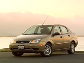 AUT 40 RK0231 01
2005 Ford Focus Gold 3/4 Front View On Pavement By Water