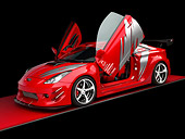 AUT 40 RK0269 01
2005 Toyota Celica GTS Custom Red 3/4 Side View On Red Floor Doors Open Studio